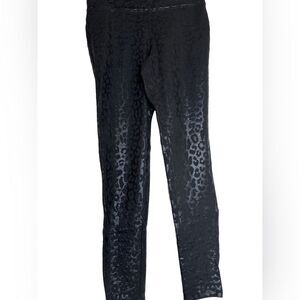 Express black leopard print leggings with slight metallic shimmer. Sz Small